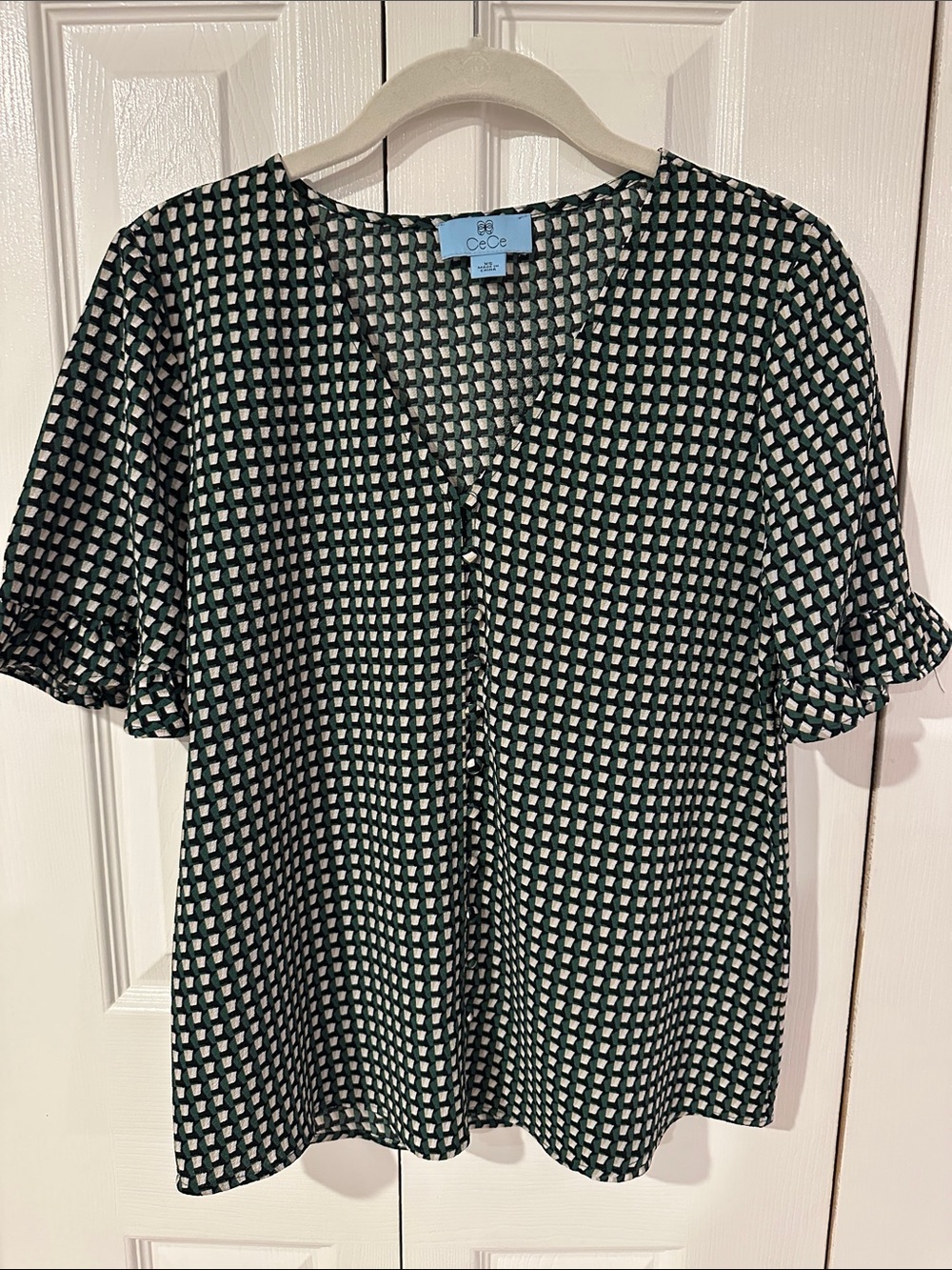 CeCe Black and White Geometric V-Neck Ruffle Sleeve Blouse